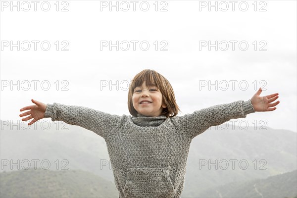 Little boy with arms opened