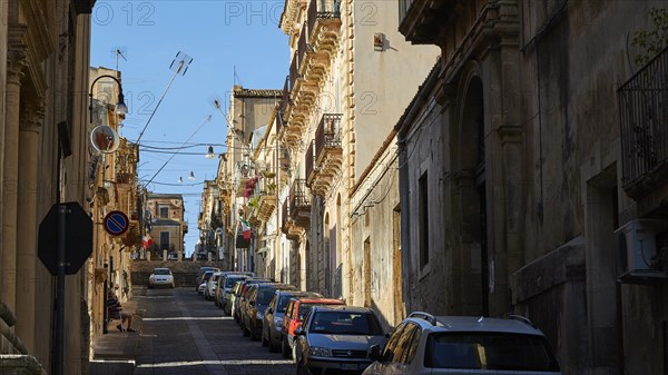 Narrow Old Town Street Cars