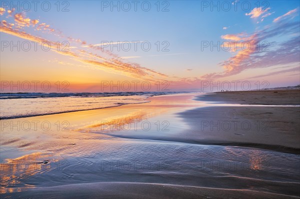 Atlantic ocean after sunset with surging waves at Fonte da Telha beach