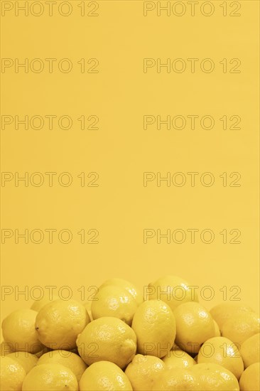 Bunch raw lemons with copy space