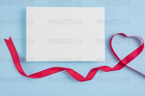 Paper near symbol heart ribbon