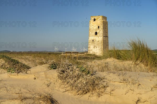 The Torre Vigia de Castilnovo tower at Playa de Castilobo beach