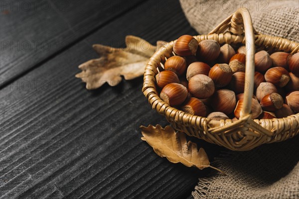 Leaves hazelnuts near fabric