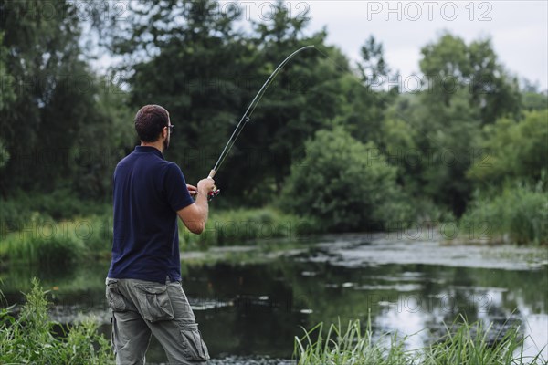 Man fishing lake