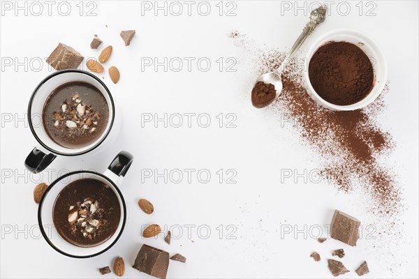 Top view hot chocolate with nuts cocoa powder