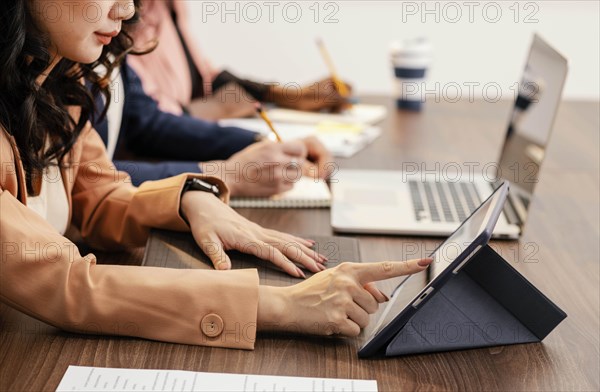 Close up women working with devices