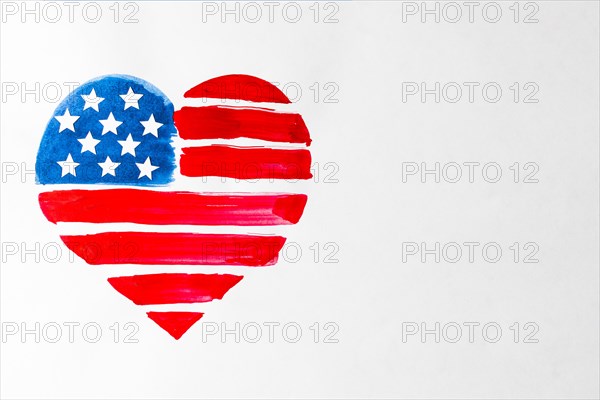 Painted red blue heart shape united states american flag white background