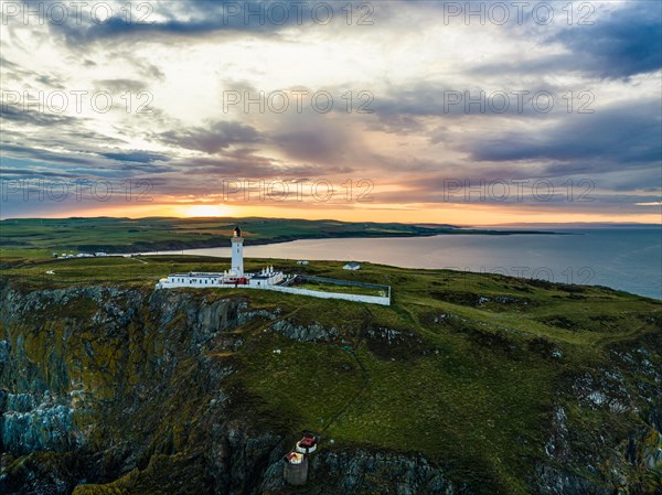 Sunset over Mull of Galloway Lighthouse from a drone