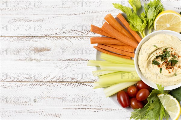 Plate hummus assortment vegetables with