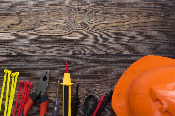 Top view electric equipment wooden background