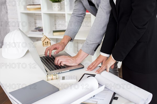 Sales agent using laptop