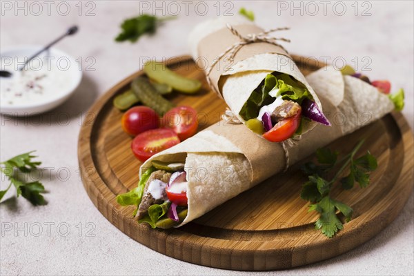 Arabic kebab sandwich wooden board high view