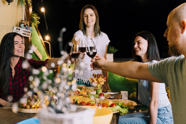 People toasting wine party