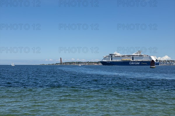 Sailboats and Color Line Cruises cruise ship off Laboe