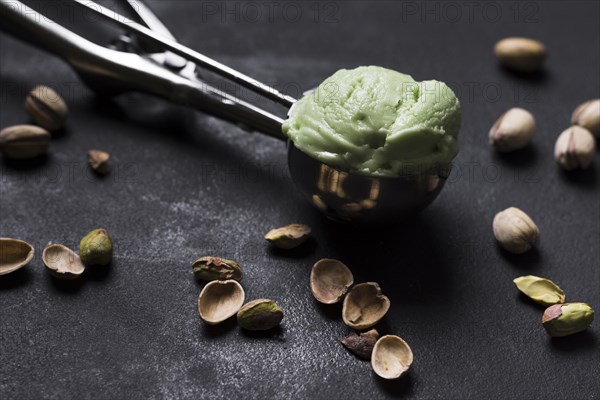 Close up tasty pistachio ice cream scoop