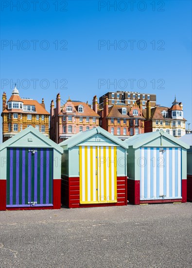 Row of beautiful colourful seaside bathing cottages in Brighton and Hove