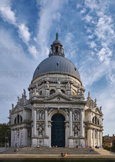Beautiful view of iconic basilica di Santa Maria della Salute or St Mary of Health by waterfront of Grand Canal