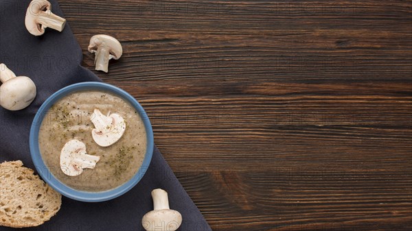 Top view winter mushroom soup bowl with copy space