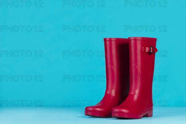 Water boots blue background
