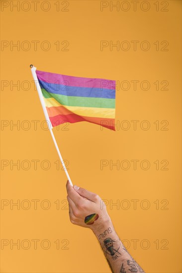 Hand waving with lgbt flag