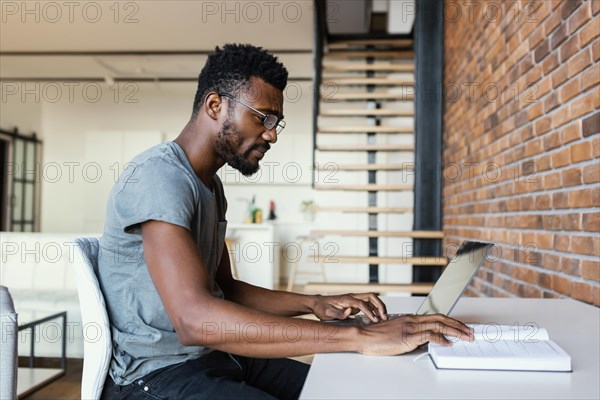 Medium shot man working desk