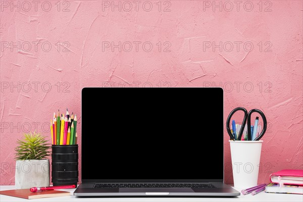 Front view laptop with stationery elements