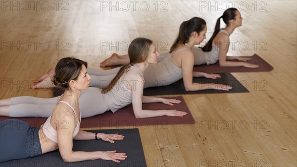 Yoga teacher teaching class8