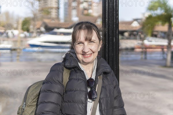 Portrait of a tourist walking along Paseo Victorica