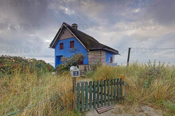 Blue beach house on the peninsula Graswarder