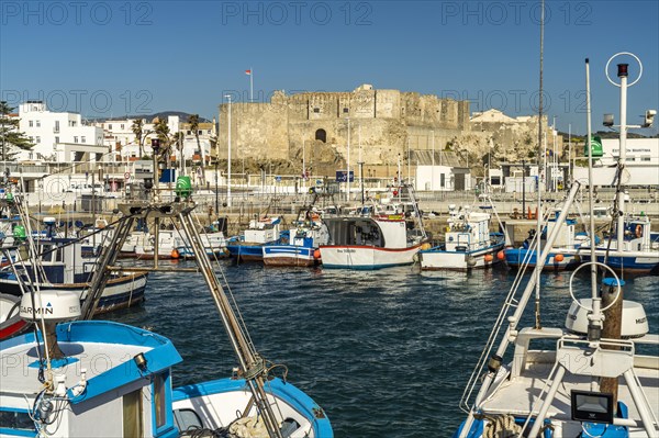 Port and the castle Castillo de Guzman in Tarifa