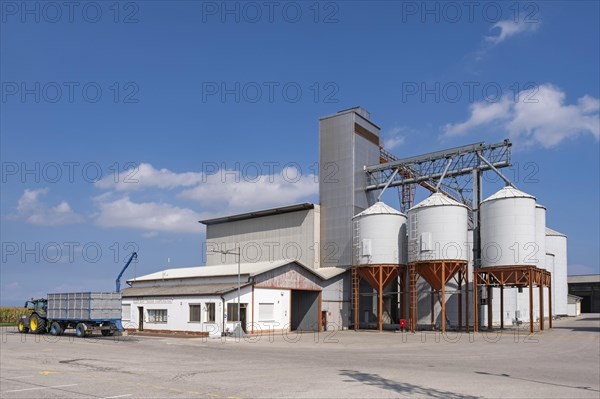 Tractor and grain silos in the Po Delta south of Chioggia