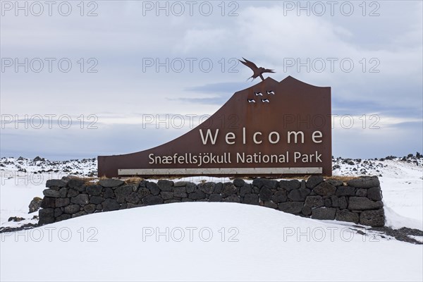Entrance sign of the Snaefellsjoekull National Park in winter on the Snaefellsnes peninsula in Iceland