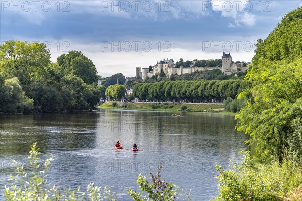 Kayaks on the river Vienne in front of Chinon with the castle