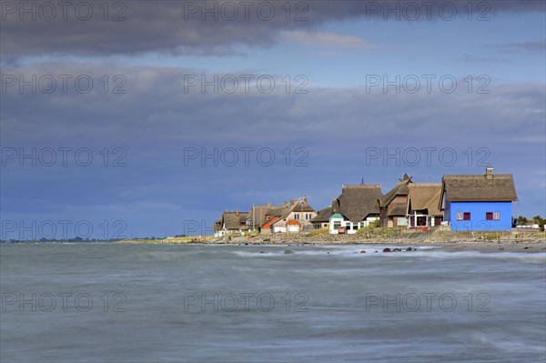 Beach houses along the Baltic Sea on the peninsula Graswarder