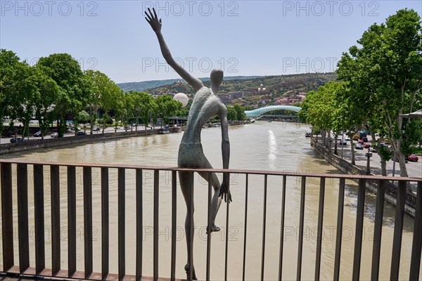 Bronze figure on the Baratashvili Bridge