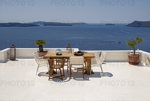 Sea view from terrace with chairs and table