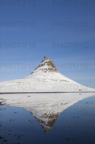 Kirkjufell mountain on the Snaefellsnes peninsula in the snow in winter