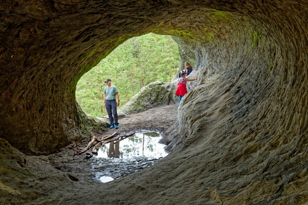 Stone tunnel at the rock formation Drei Zinnen