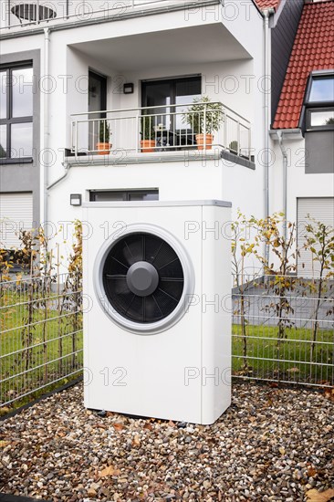 Air source heat pump in front of an apartment building in Hilden