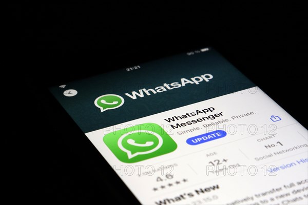 Detailed view of a smartphone with Whatsapp app in the iPhone App Store