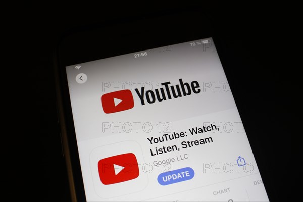 Detailed view of a smartphone with Youtube app in the iPhone App Store