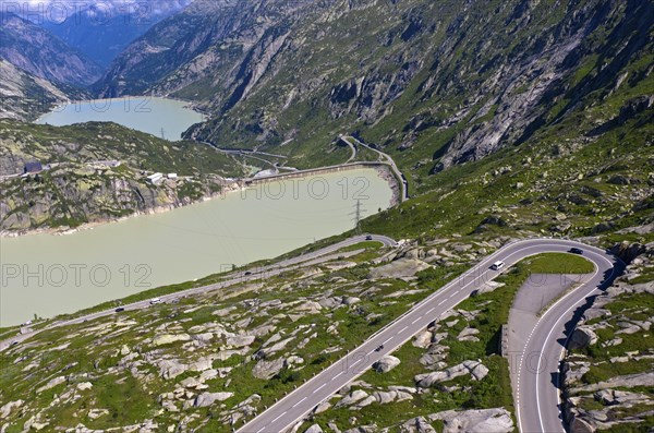 Serpentine of the Grimselpass road in front of the reservoirs Grimselsee