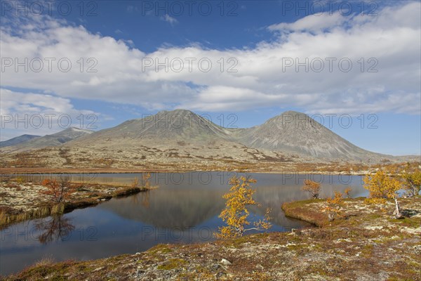 Lake in front of the mountain Stygghoin in autumn