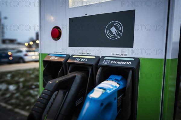 Different plugs of a public charging station for e-cars of the Stadtwerke Duesseldorf