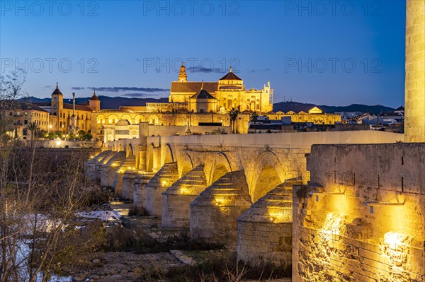 Roman bridge over the river Rio Guadalquivir and the Mezquita