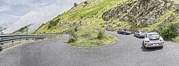 Photo with reduced dynamics saturation HDR of view on hairpin bend serpentine of mountain pass road Passo della Teglia