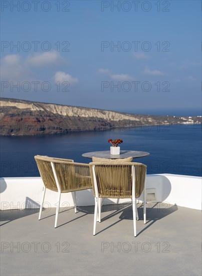 Sea view from terrace with chairs and table