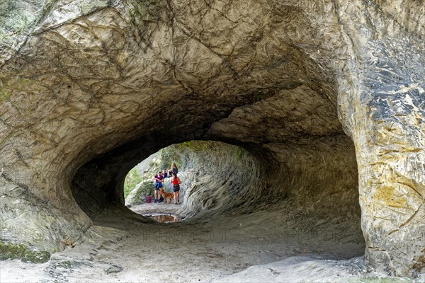 Stone tunnel at the rock formation Drei Zinnen