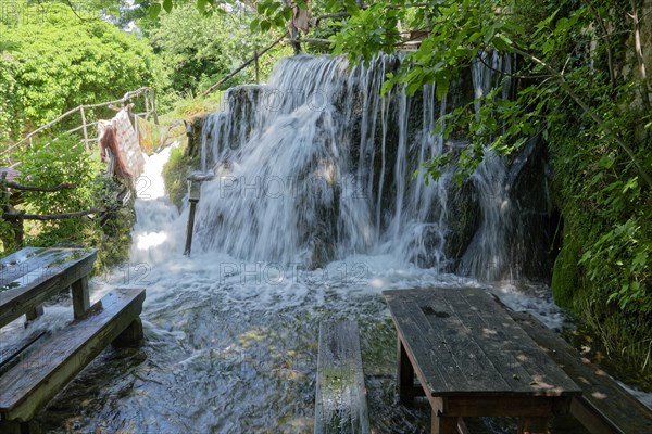 Waterfall at the old mill Kristijan on the Krka stream in the Krka National Park in Northern Dalmatia. Sibenik-Knin