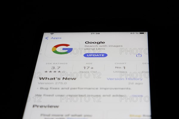 Detailed view of a smartphone with Google App in the iPhone App Store
